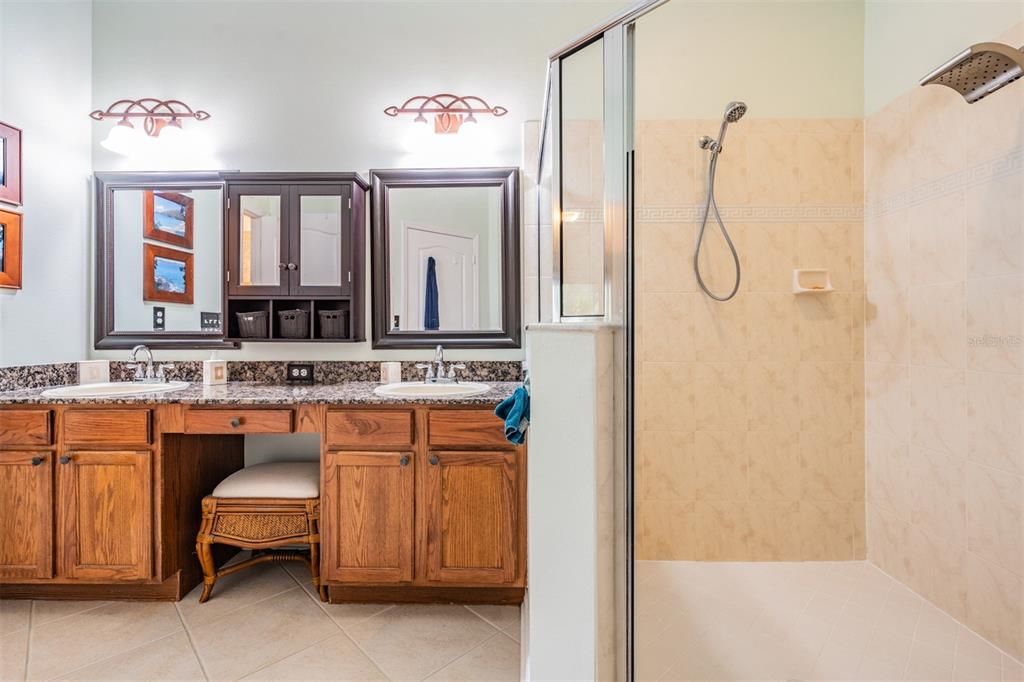 Master Bathroom, double vanities, granite countertops, spacious shower.