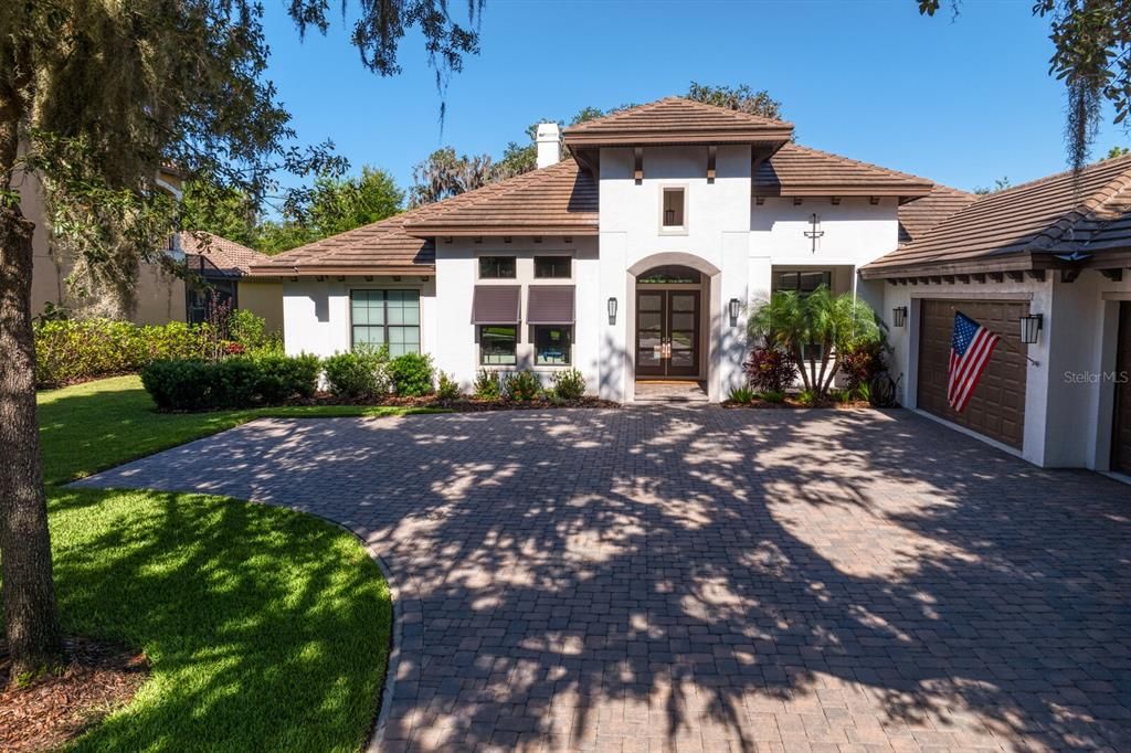 4-car garage and additional parking pad!