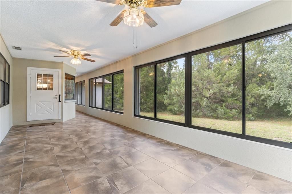 Enclosed lanai with hurricane shutters