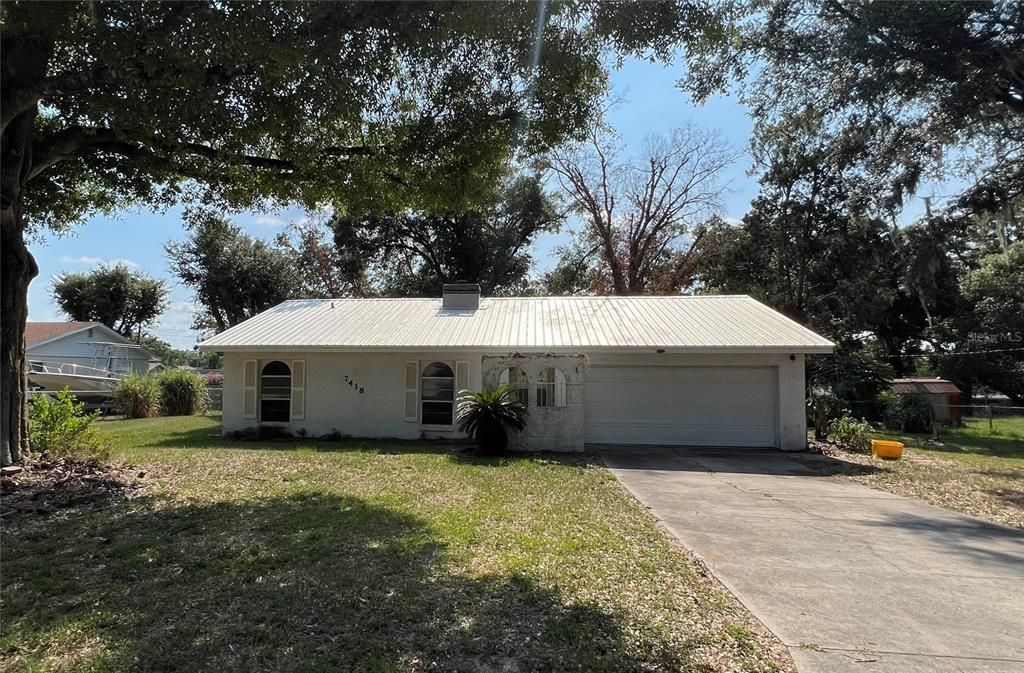 Front of property, facing east