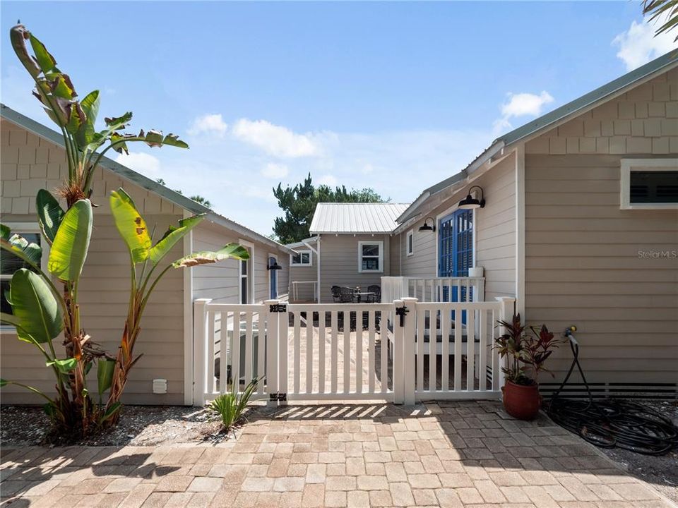 Parking pad with access to home and garage