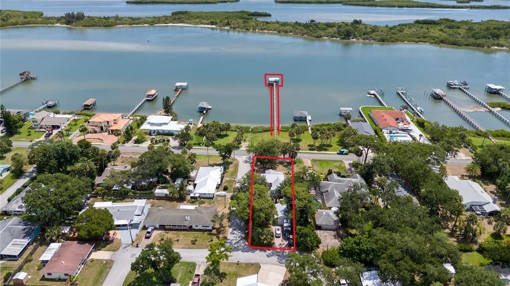 Aerial view of lot with deep water dock