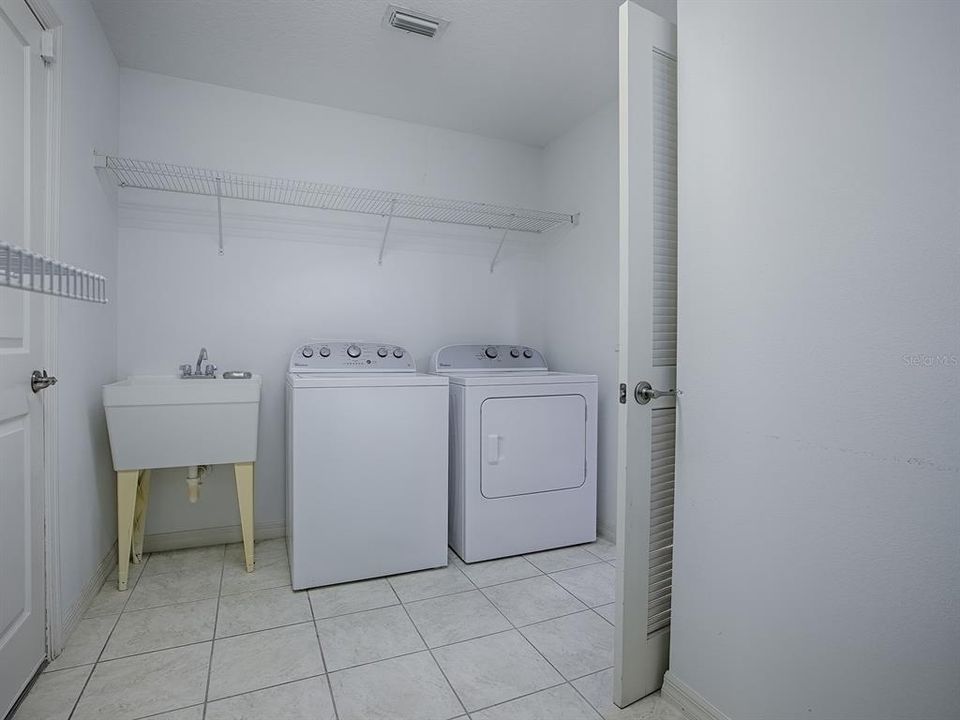 Indoor laundry room off the kitchen