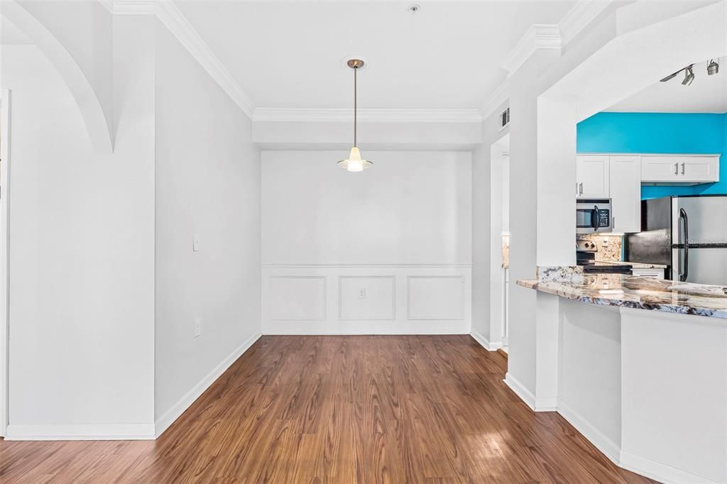 Dining room with wainscoting panels.