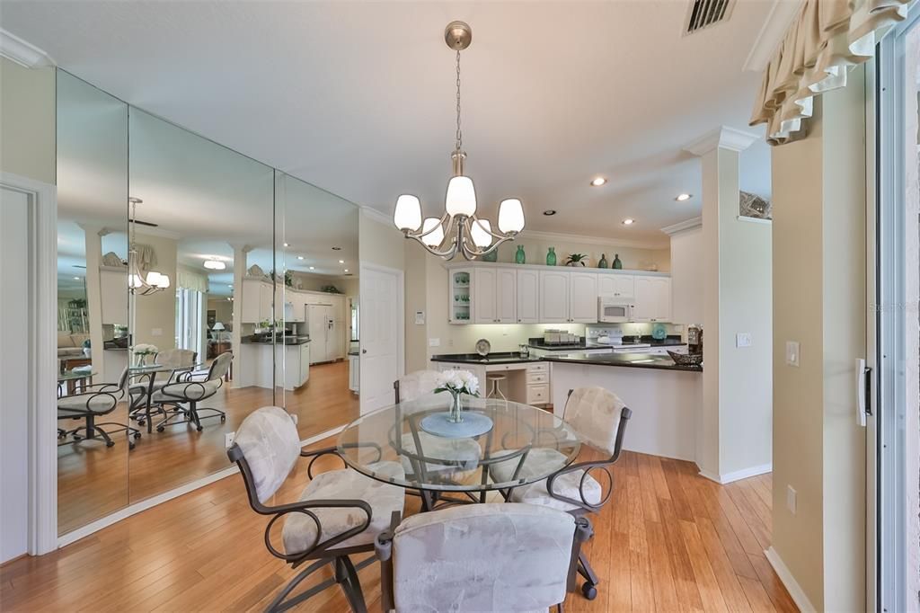 Breakfast nook with sliders to the pool