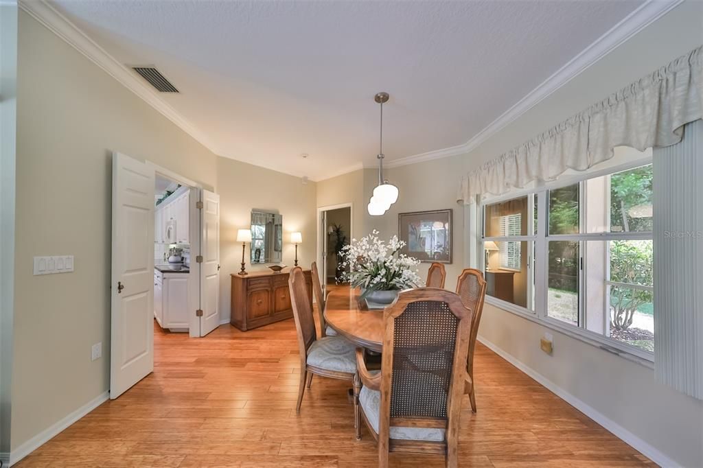 Dining area looks out to preserve back yard