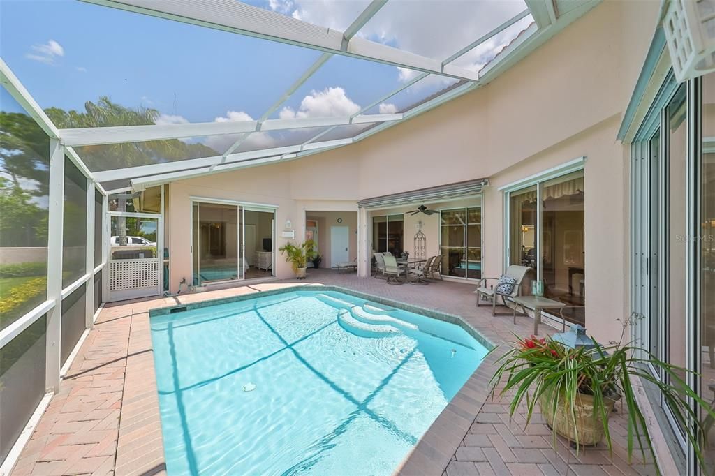 Guests have their own master bedroom and bath off the pool