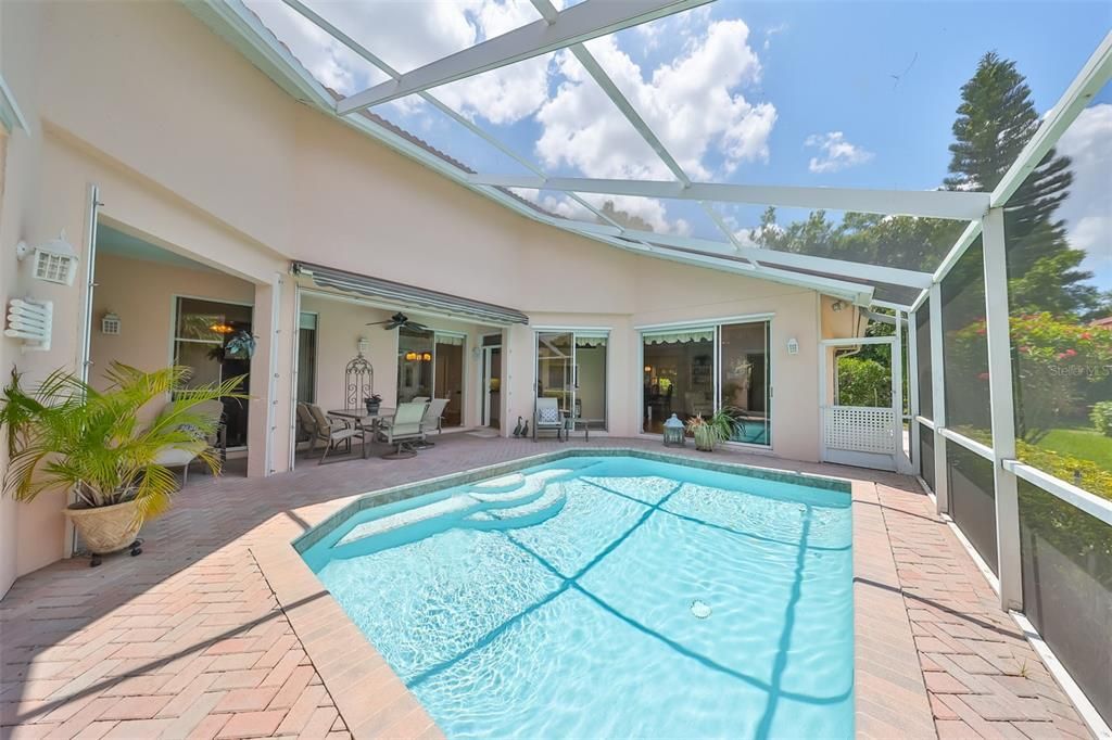 All sliding doors open to pool area