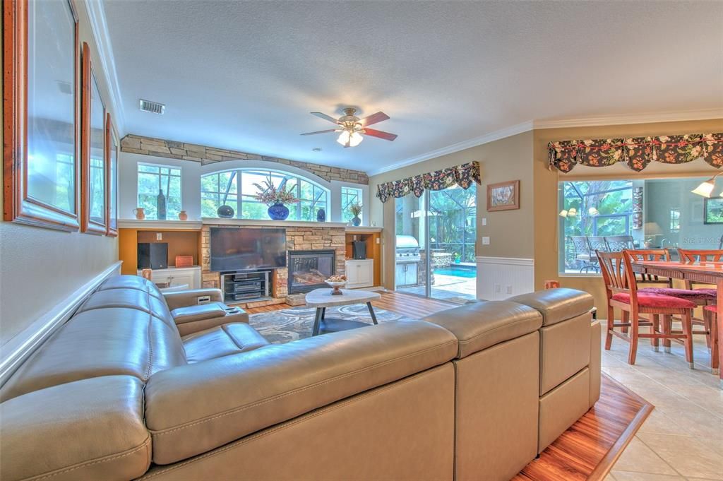 Family room with sliders and views to pool.