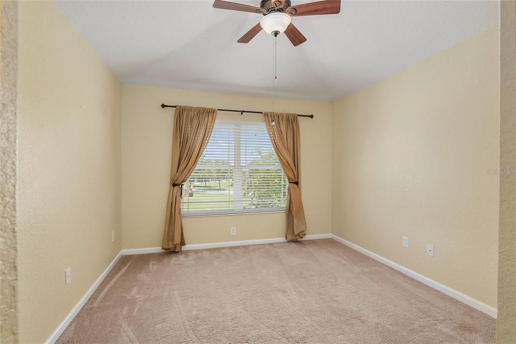 Guest bedroom #2- Cathedral ceilings, upgraded fan fixture