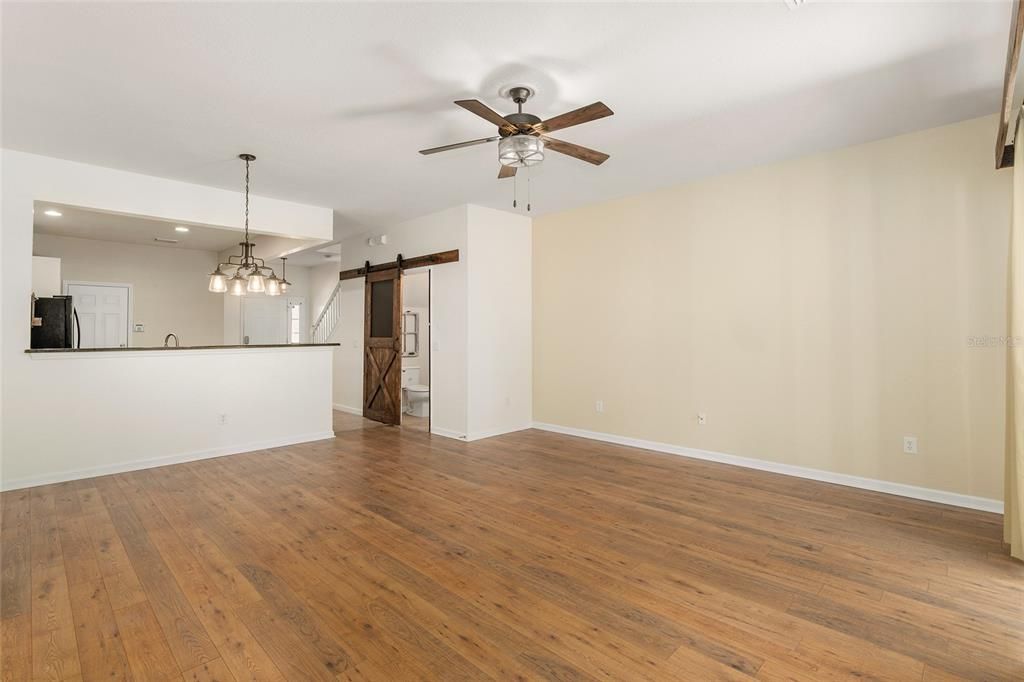 Large living room with laminate flooring