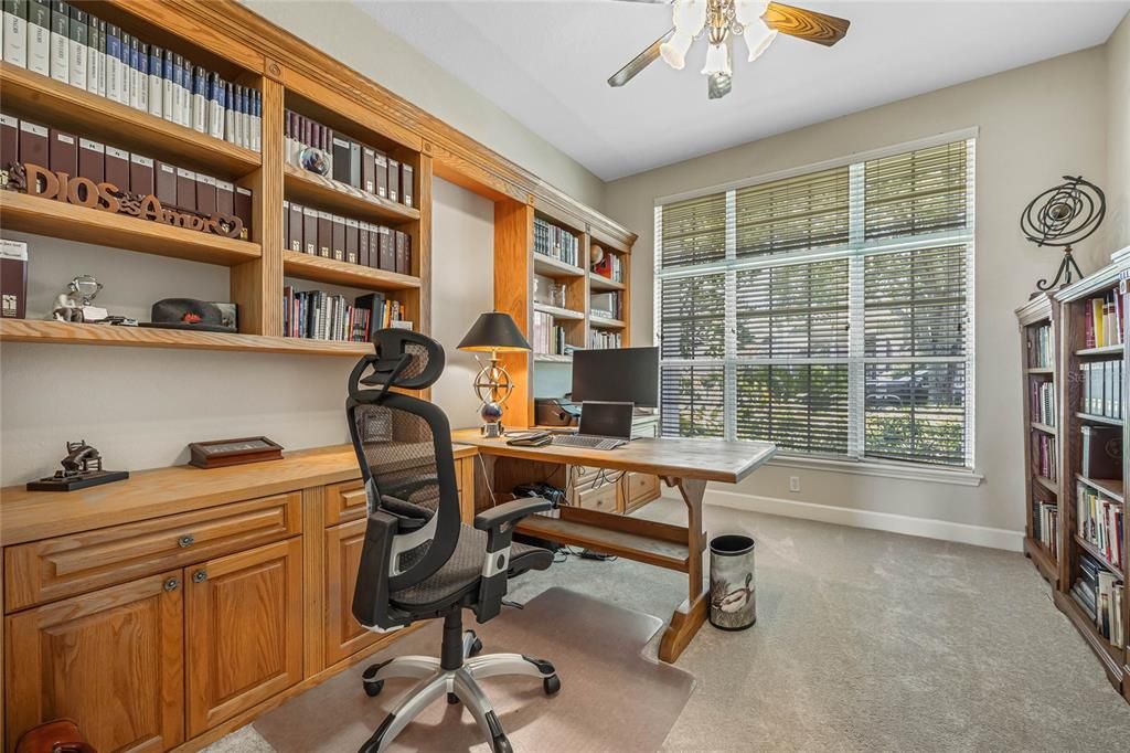 Wonderful office space with built in cabinetry