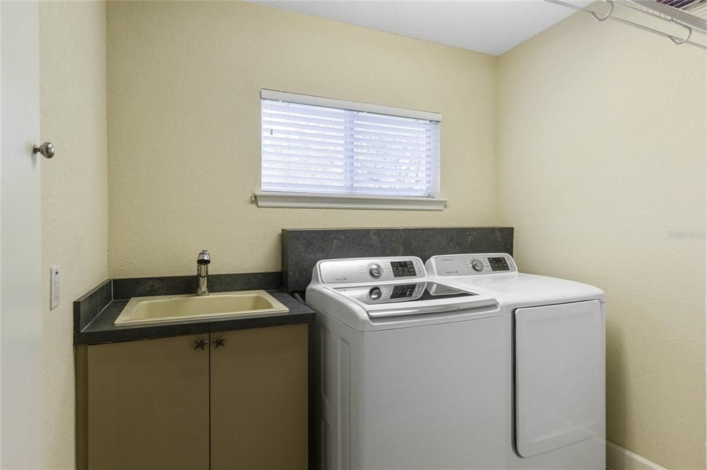 Laundry room with sink