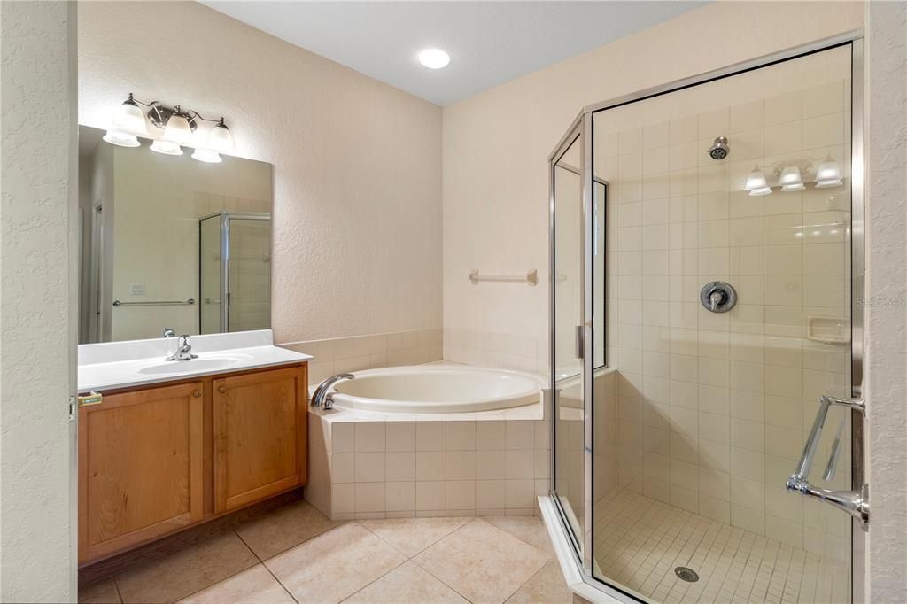 PRIMARY BATHROOM WITH SOAKING TUB AND WALK-IN SHOWER