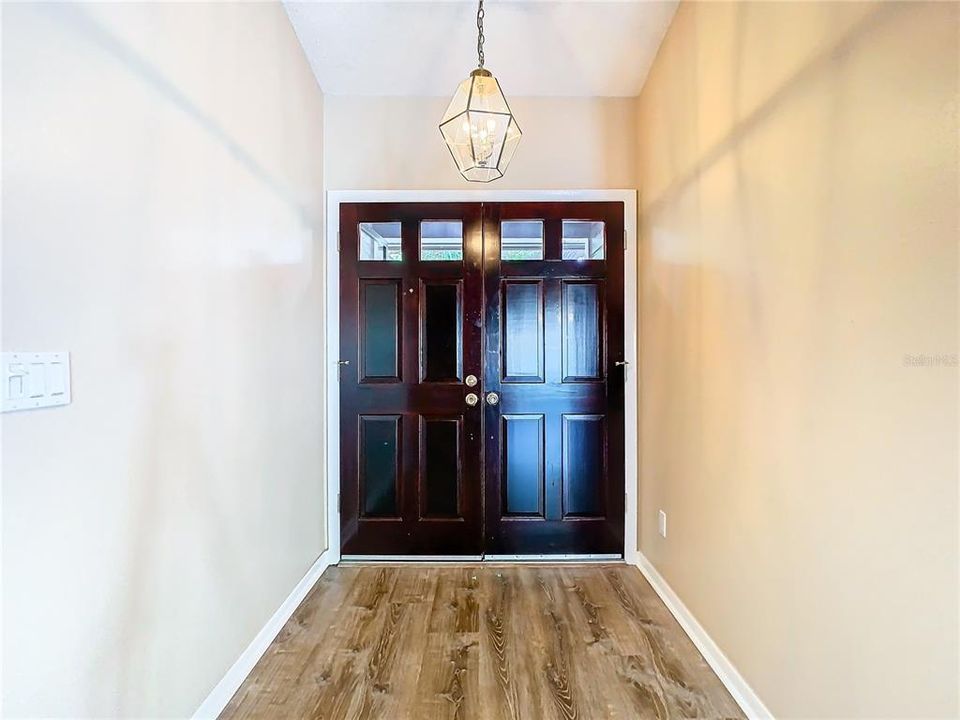 hall way and double entry doors
