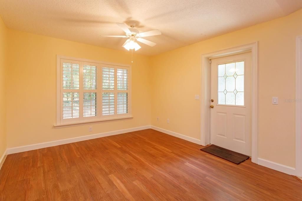 View of Breakfast Room (or Informal Dining area) and Back door.