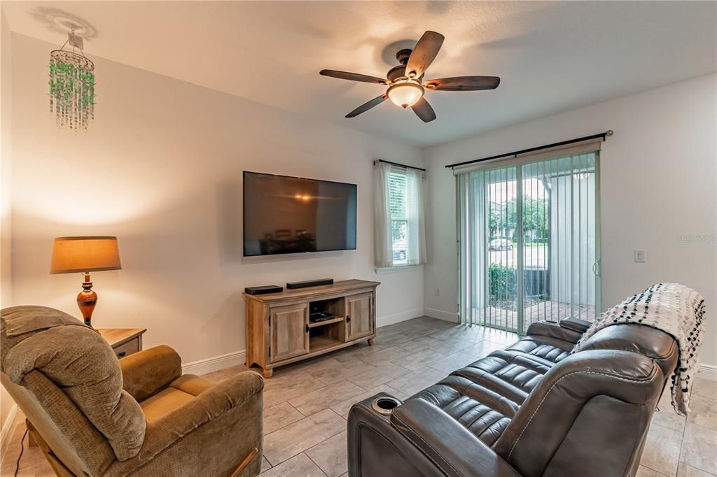 Living area features a sliding glass door out to your covered patio.