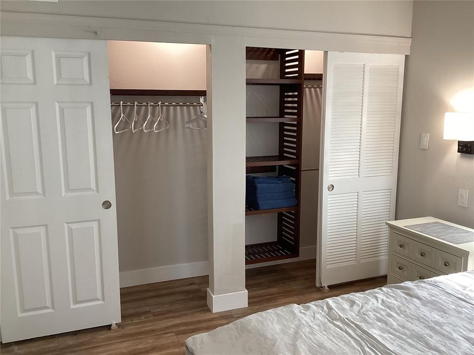 Full wall of custom designed closet space.