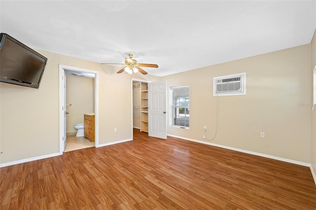 Primary suite with walk-in closet and ensuite bathroom