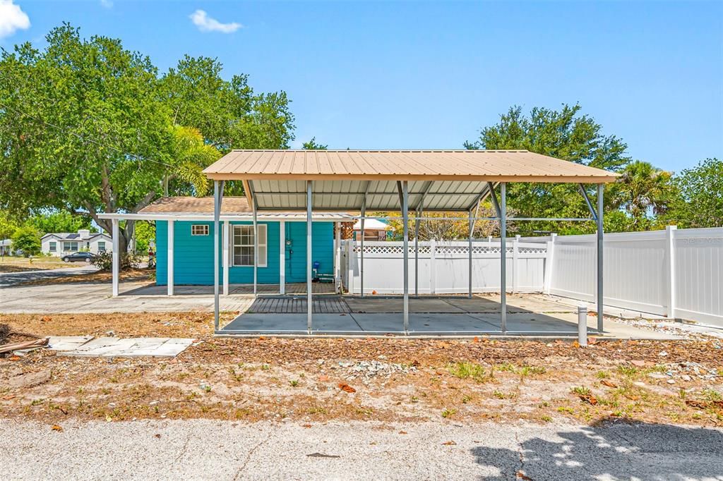 Carport and covered parking for 2 more cars, or an RV