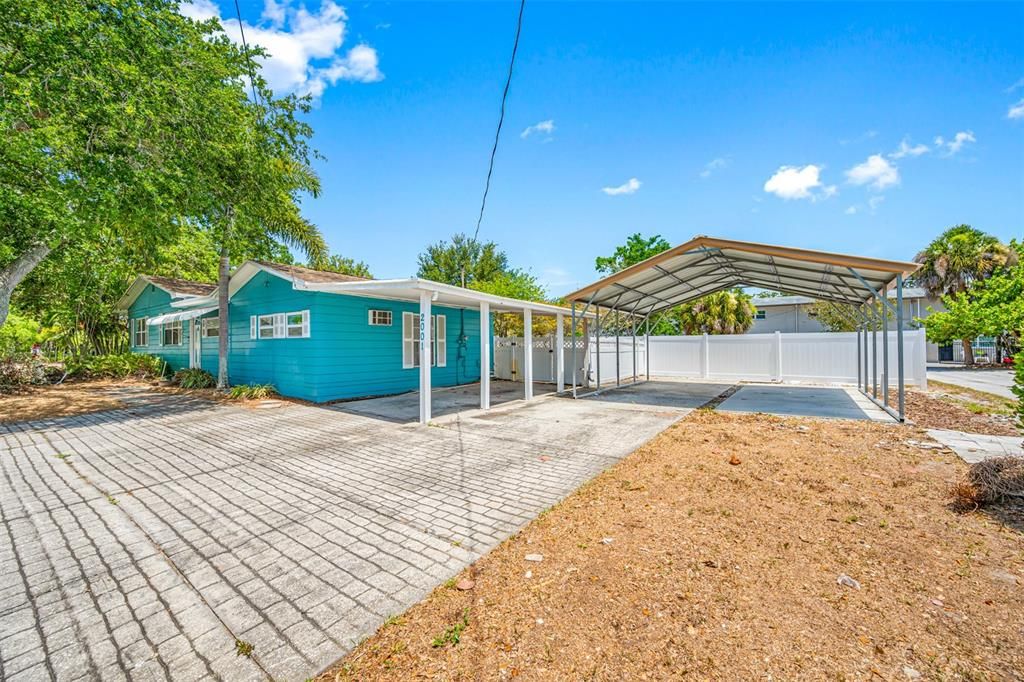 Carport and covered parking for 2 more cars, or an RV