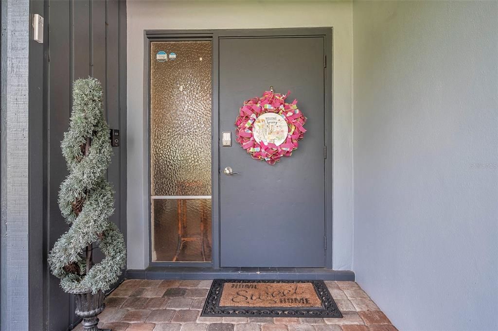 Inviting Front Door With Paver Landing