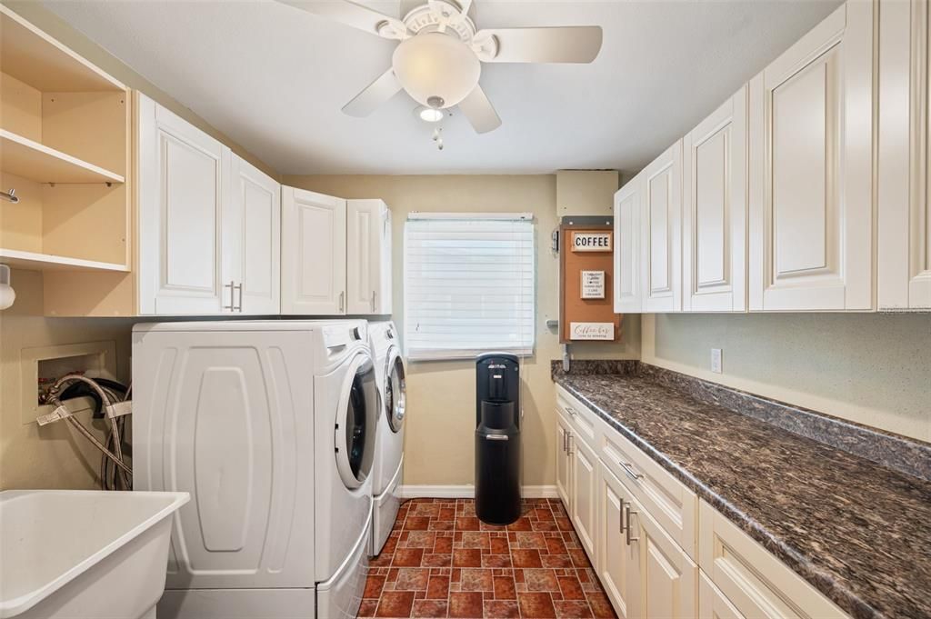 Butler's Pantry/Laundry Room Including Utility Sink, Additional Refrigerator, Counter Space For Small Appliances And Abundant Storage