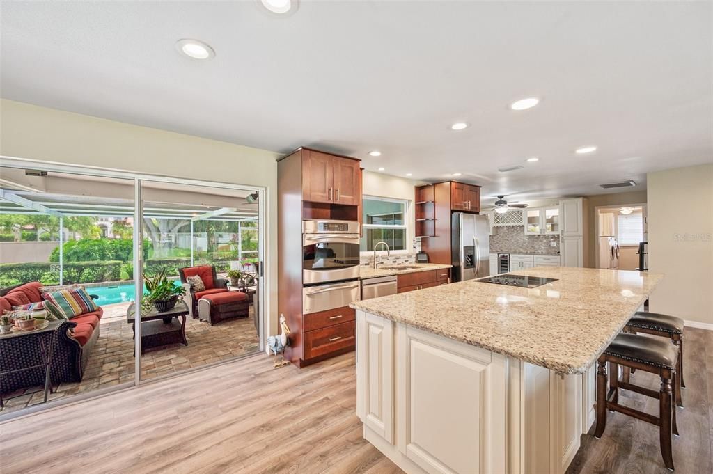 Kitchen Is Open To Living Room.  Over-sized 13ft Granite Counter,  Warming Drawer