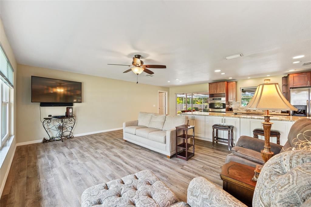 Living Room With 10mil Ash Laminate Flooring