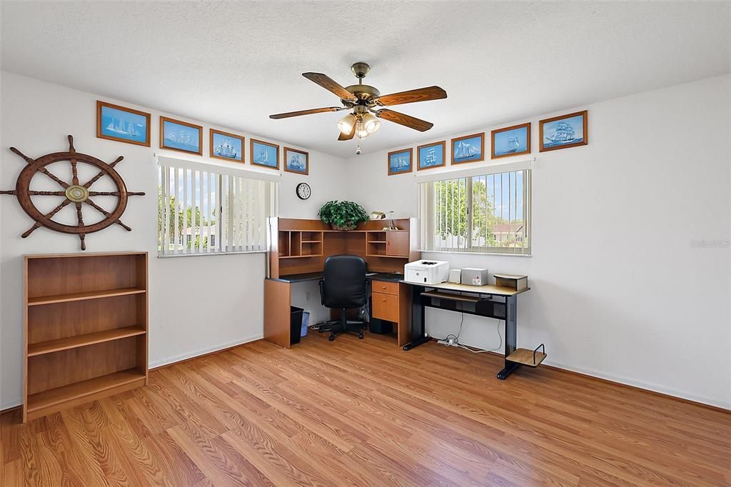 Back guest bedroom being used as a study