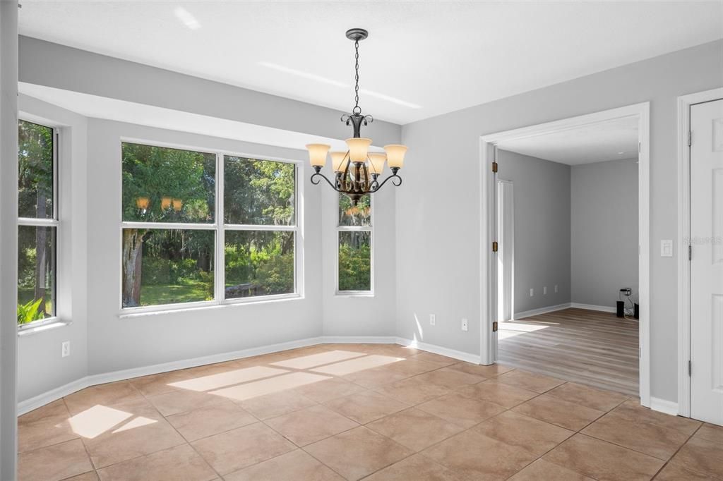 Eat in Kitchen area with sliders and Lots of Natural lighting