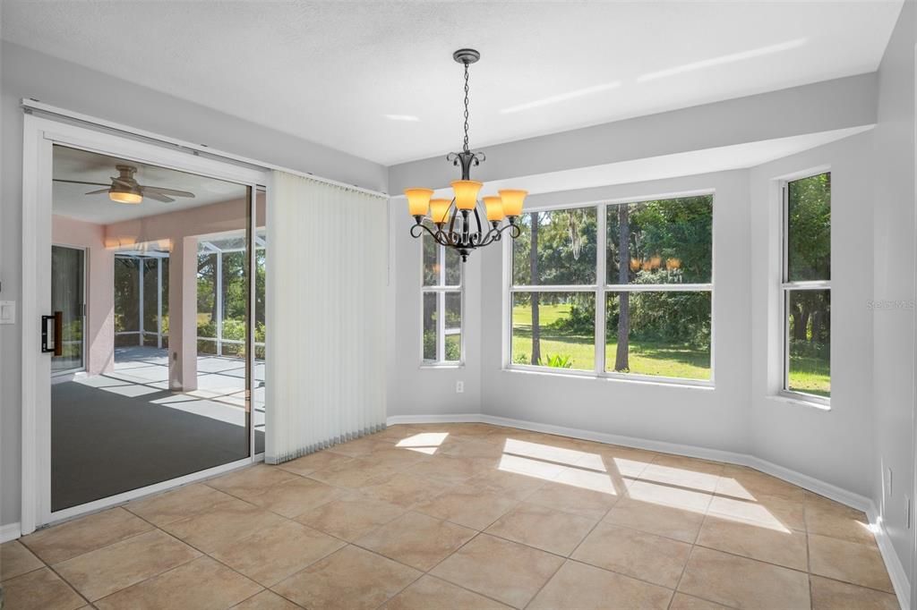 Eat in Kitchen area with sliders and Lots of Natural lighting