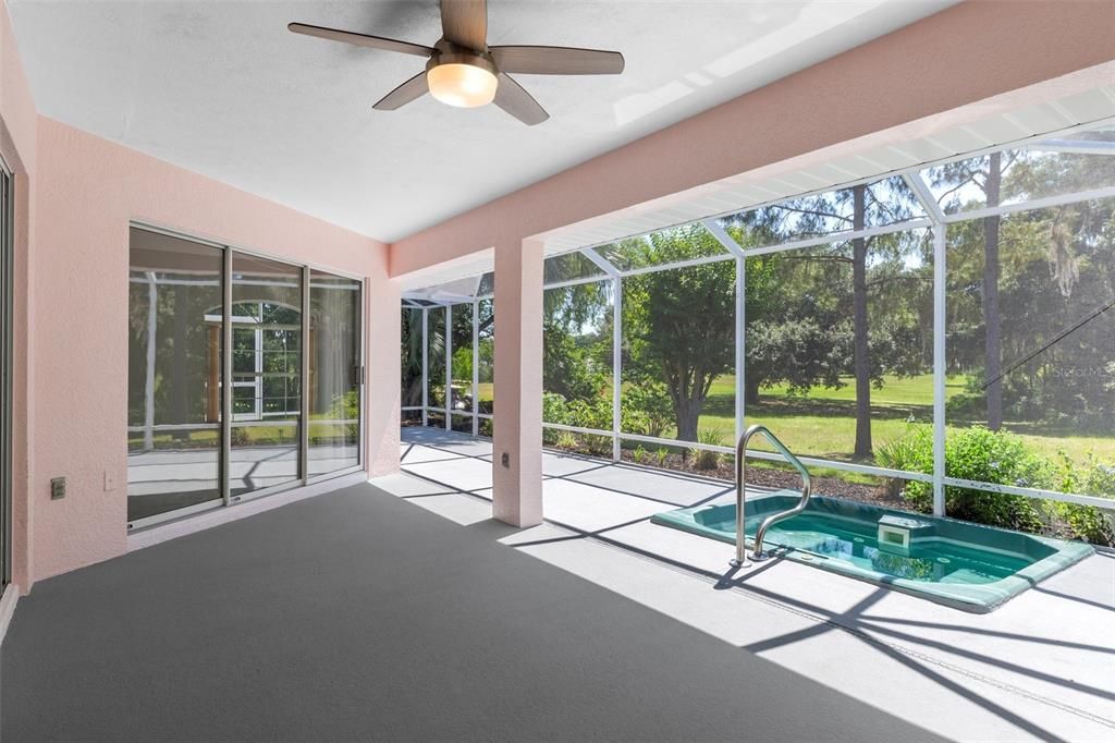 Enclosed Large lanai with in ground heated spa