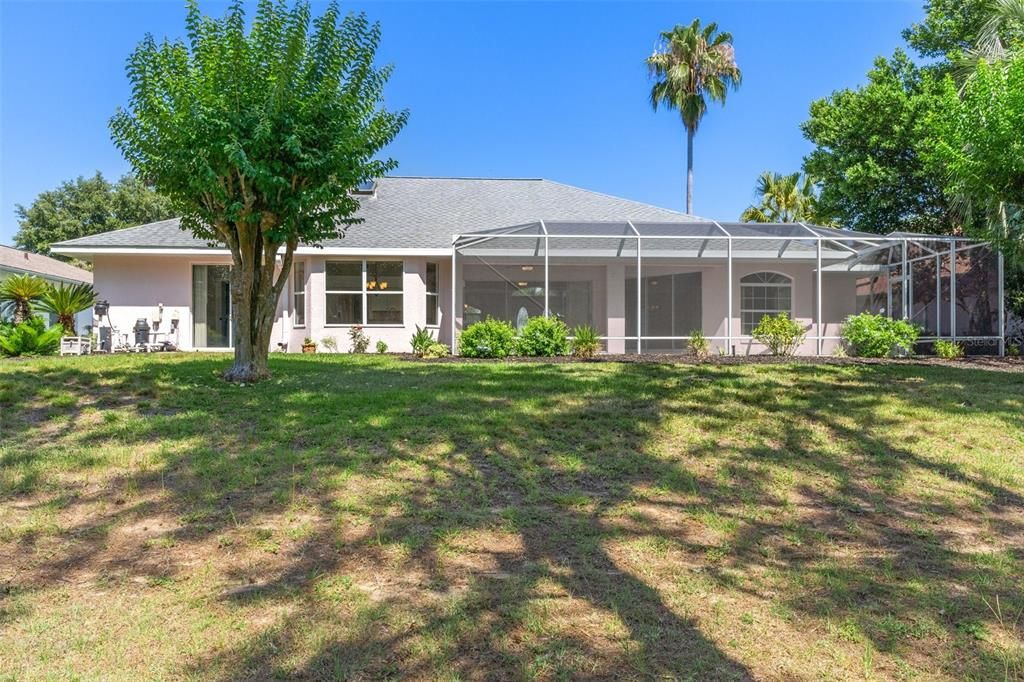 Rear view of this beautiful manicured home