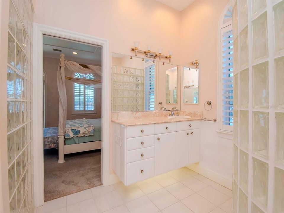 Primary Bathroom with seperate vanities, shower and water closet