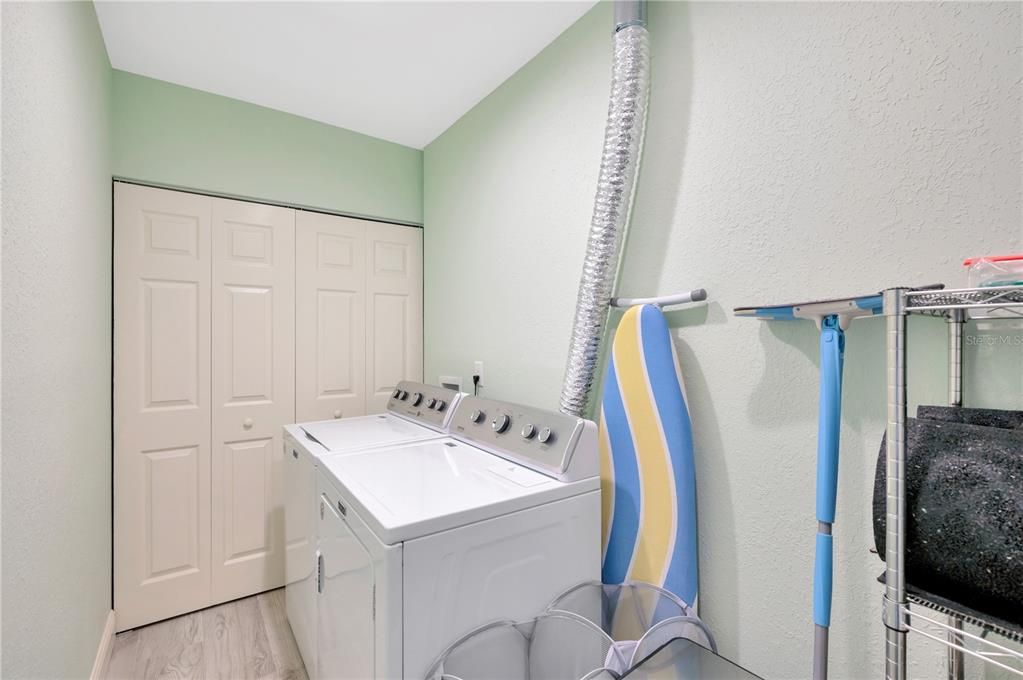 Full size washer and dryer in hallway