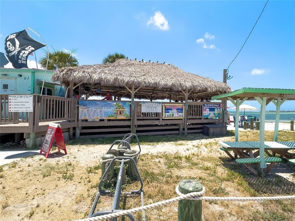 Enjoy a cool beverage & watch the sun set at the Causeways Tiki Bar popular with locals!