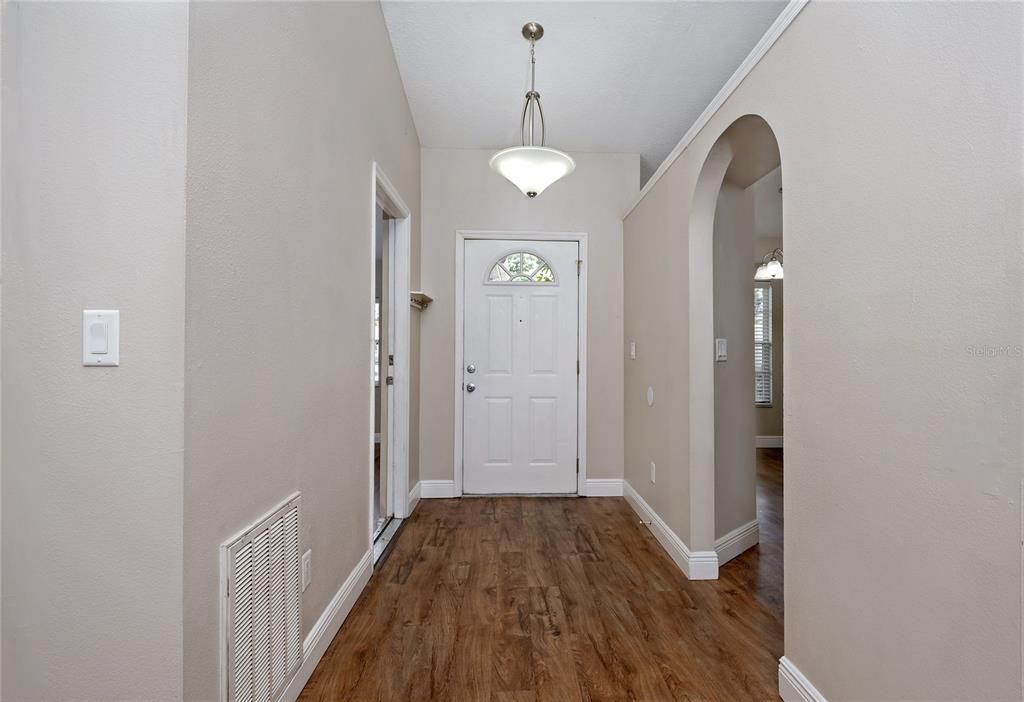 Foyer with arched doorway