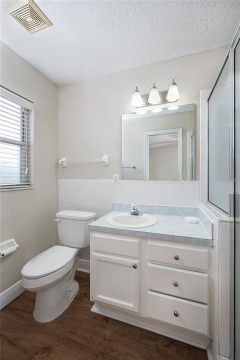 Guest bathroom with tub and shower combination