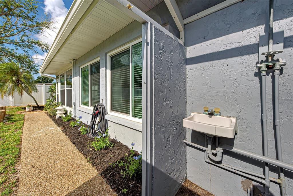 Outdoor shower and sink area- great for anyone who enjoys gardening