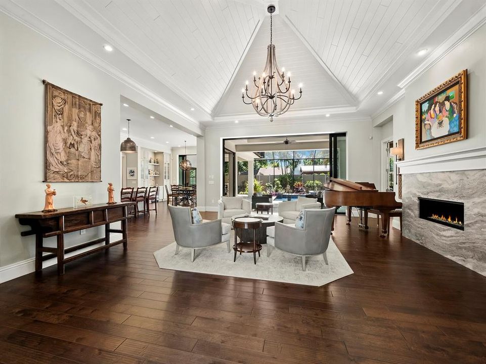 open floor plan-living room, vaulted wood ceiling