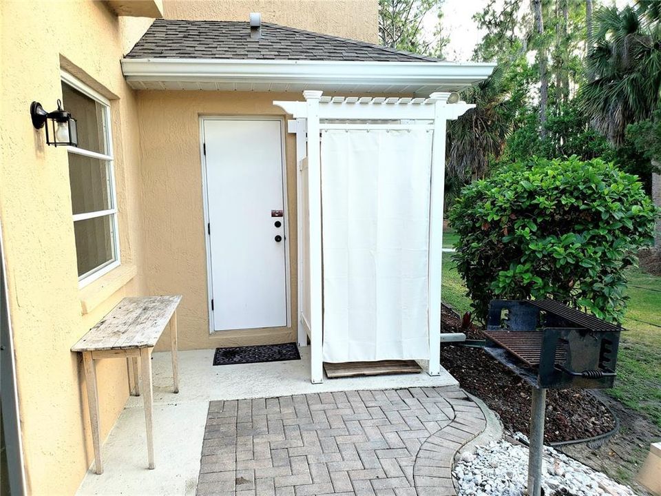 Outdoor shower with bathroom access