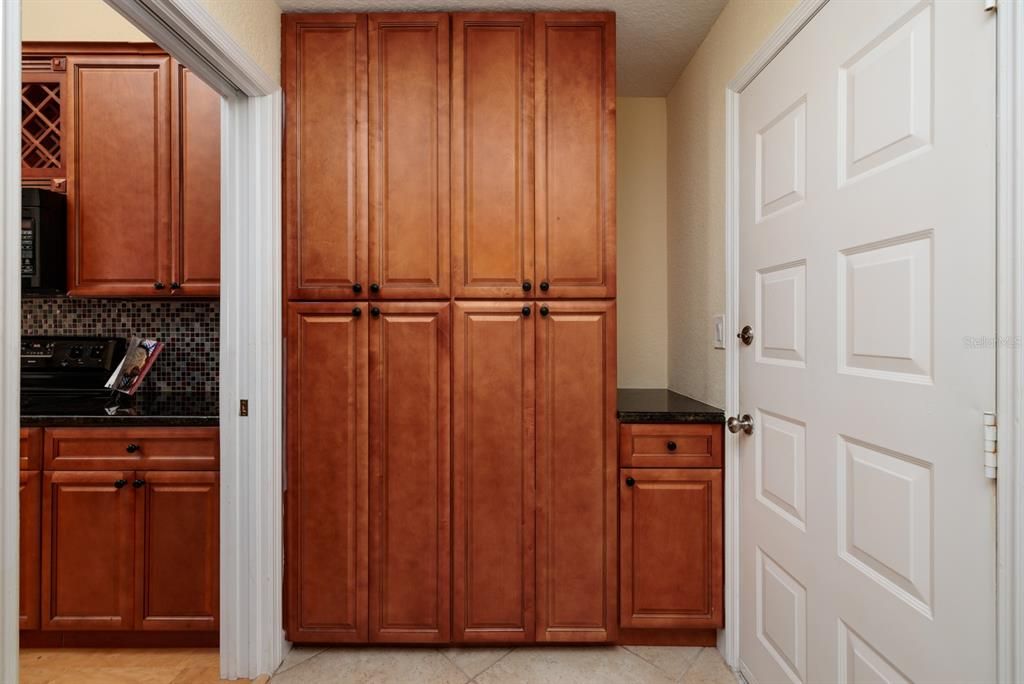 Laundry Room with Cabinets and Pull Out Shelves