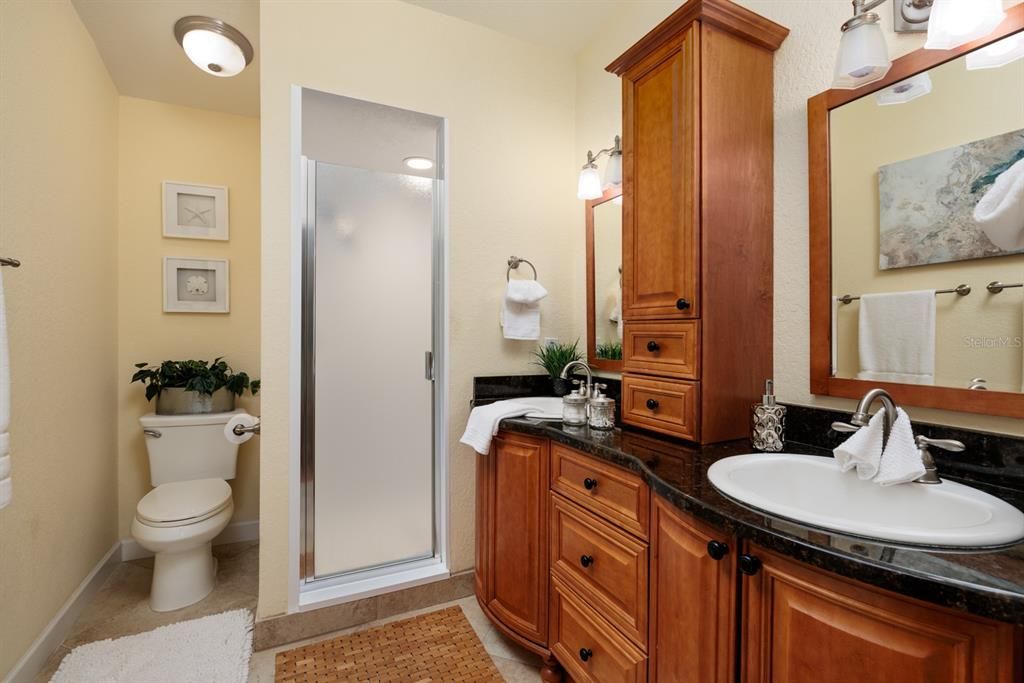 Ensuite Bath with Custom Cabinets and Built Ins