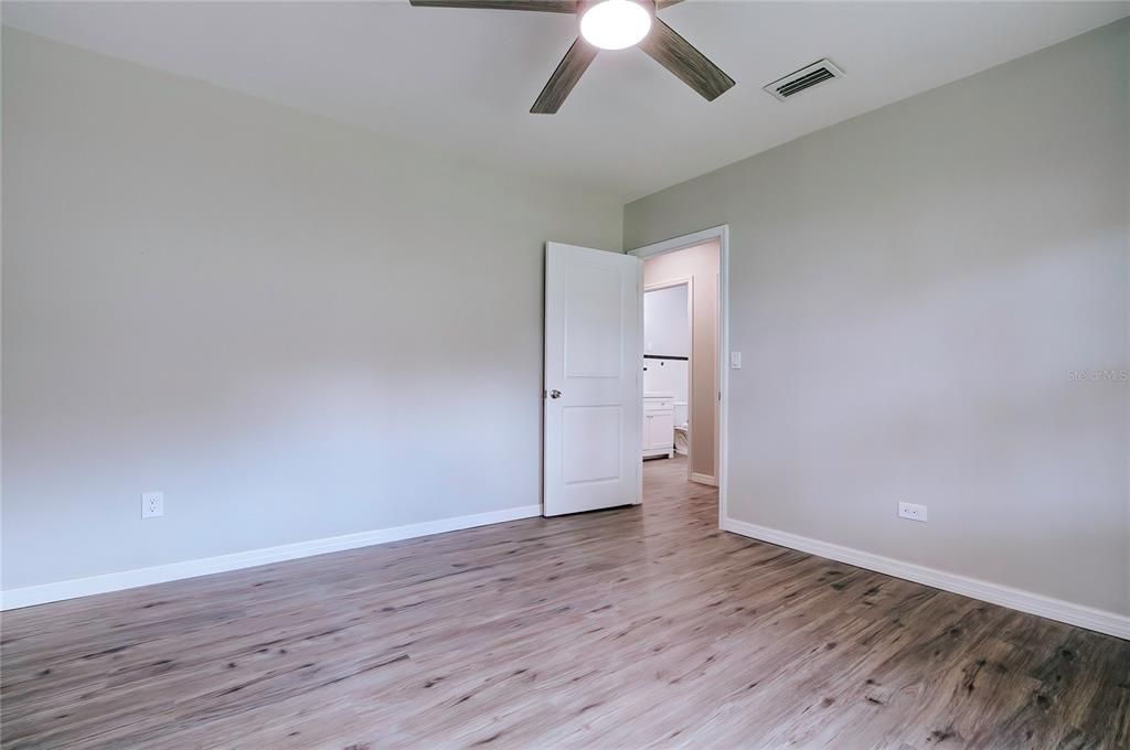 Walk-In Closet within Primary Bedroom