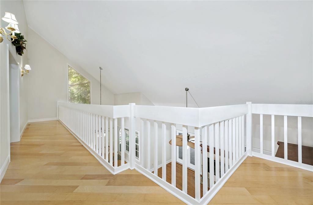 Second Floor Landing to Second Primary Bedroom Loft to Livingroom and eat-in Kitchen