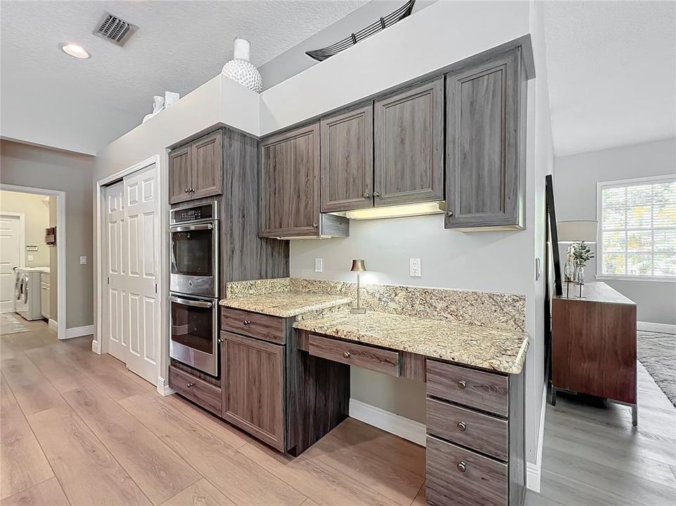 Kitchen with pantry, double ovens and desk