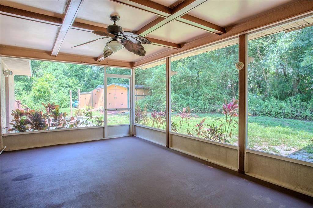 Screened in and covered back porch with Ceiling Fans