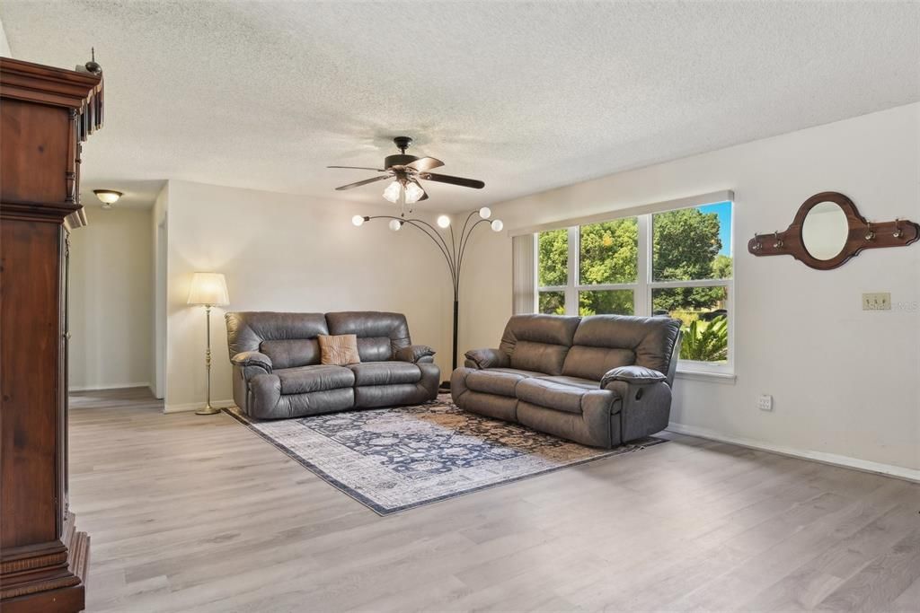Stepping into the house through the front door, an IMMEDIATE FEELING of WARMTH and TRANQUILITY is felt with the OPEN FLOOR PLAN, the ABUNDANCE OF NATURAL LIGHT and the FINE SELECTION of UPGRADES THAT give the home an AFFORDABLE LUXURY FEEL!