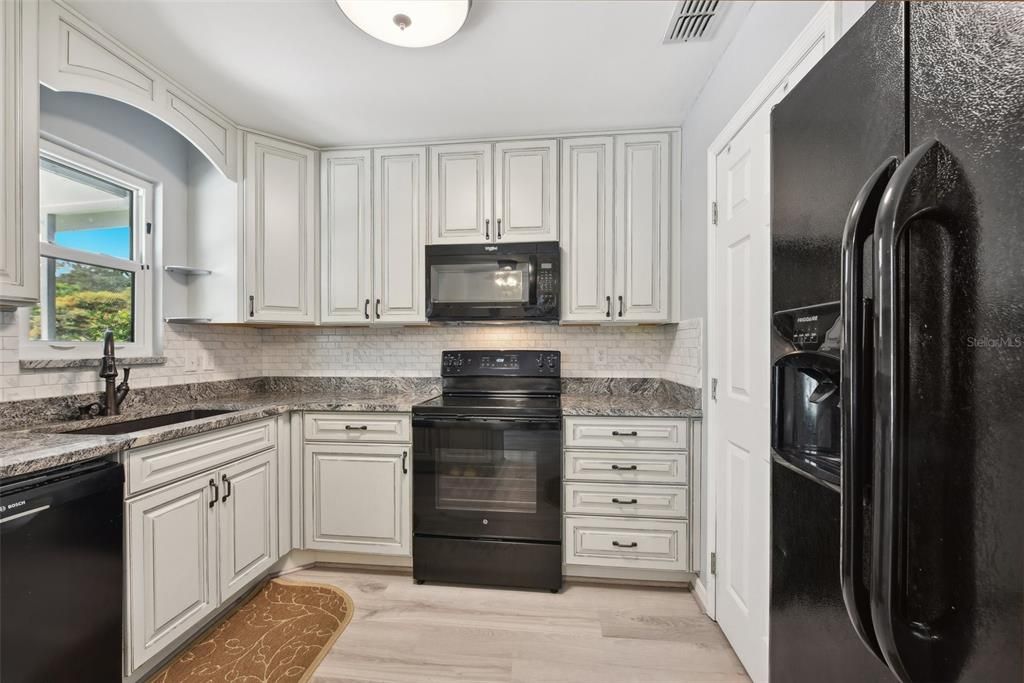 The KITCHEN RENOVATION itself has all NEW CUSTOM and HIGH-END CABINETRY, UPGRADED GRANITE COUNTERTOPS, EXTENDED COUNTER SPACE, NEW FLOORING and NEW APPLIANCES.